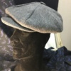 Casquette rayée à bouton
